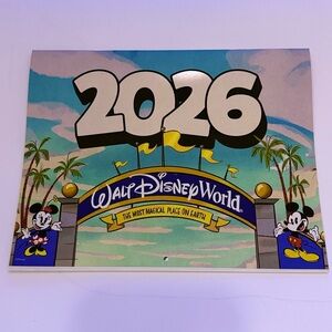 Disney 2026 Passholder Calendar with Mickey Mouse and Blue Sky